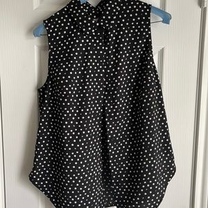 Black and white polkadot blouse. Button up.